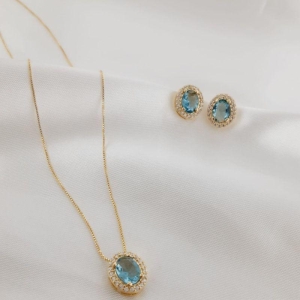 CONJUNTO CRAVEJADO OVAL AZUL OURO