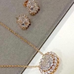 CONJUNTO OURO OVAL CRAVEJADO