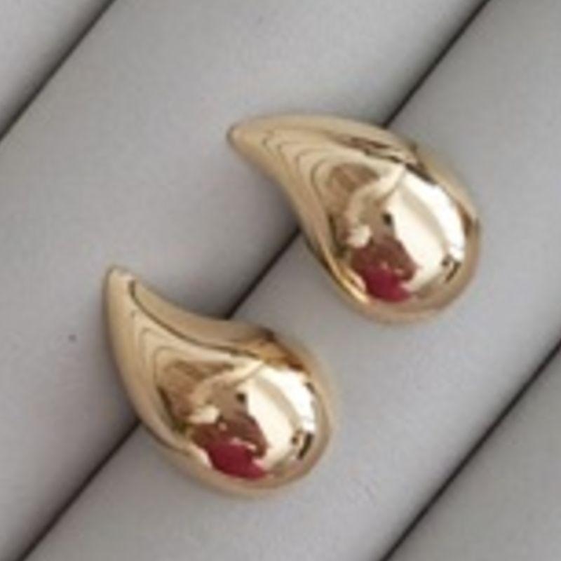 BRINCO GOTA ORGANICA OURO POLIDO P