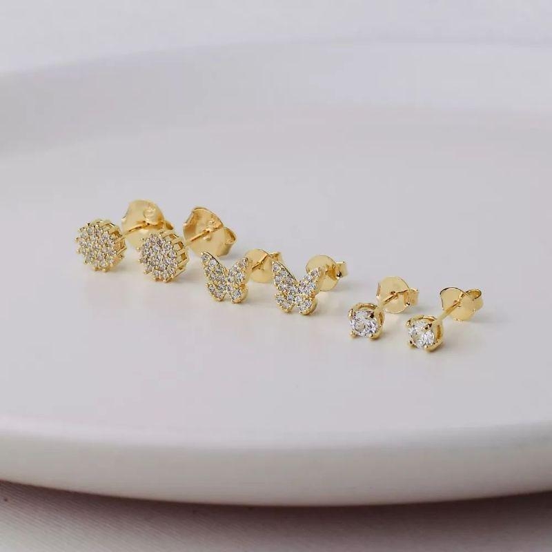 Trio de brincos dourado cravejados cristais