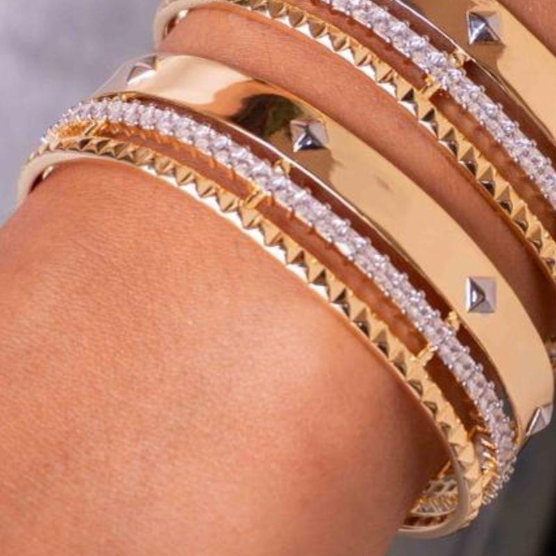 BRACELETE CRAVEJADO TRABALHADO OURO