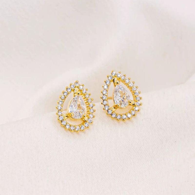 BRINCO GOTA CRAVEJADA OURO