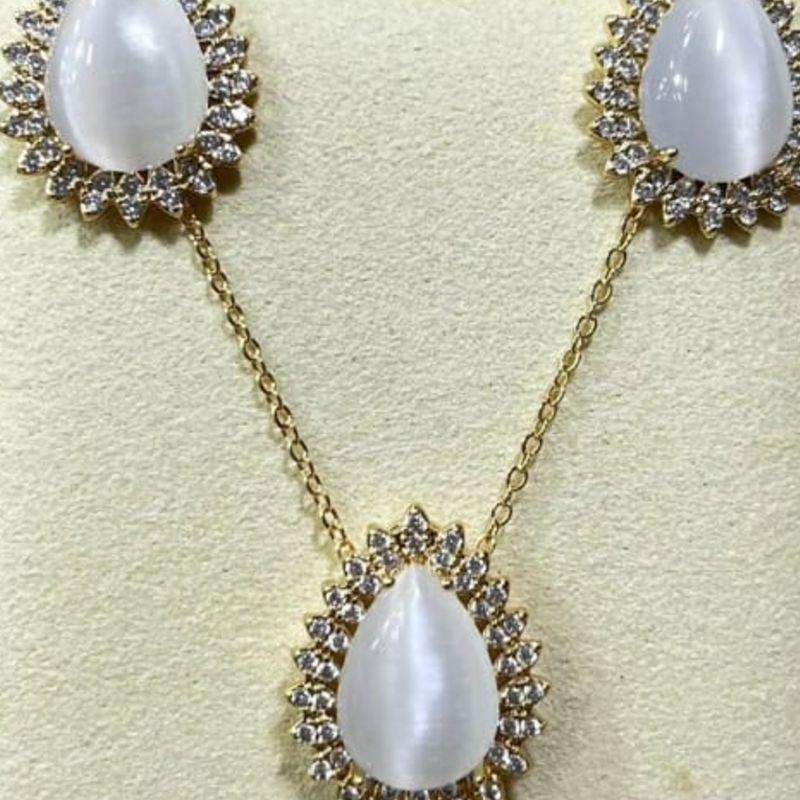 CONJUNTO GOTA OLHO DE GATO OURO