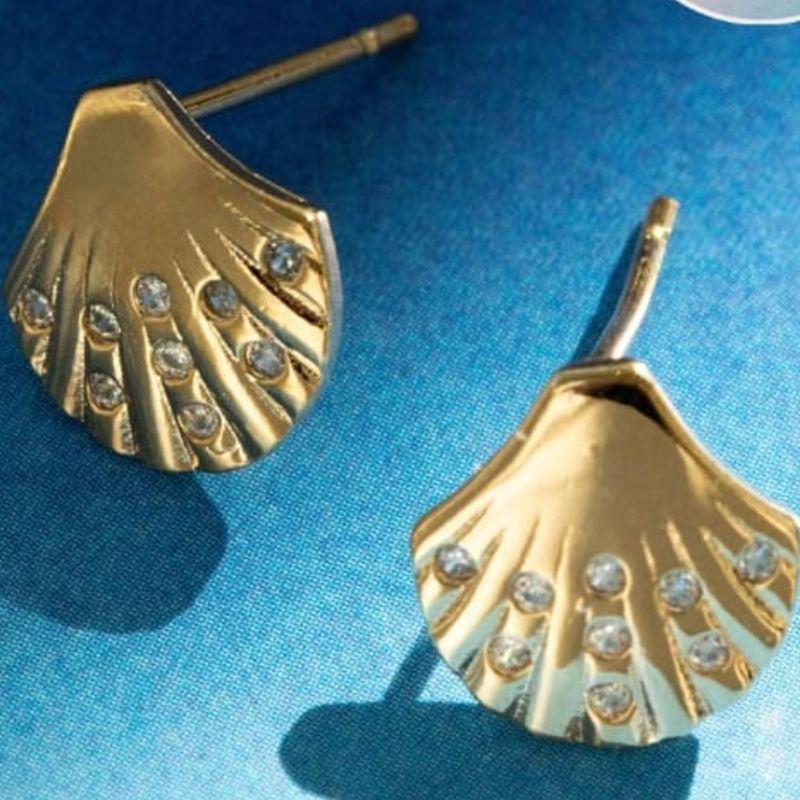 BRINCO CONCHA OURO P