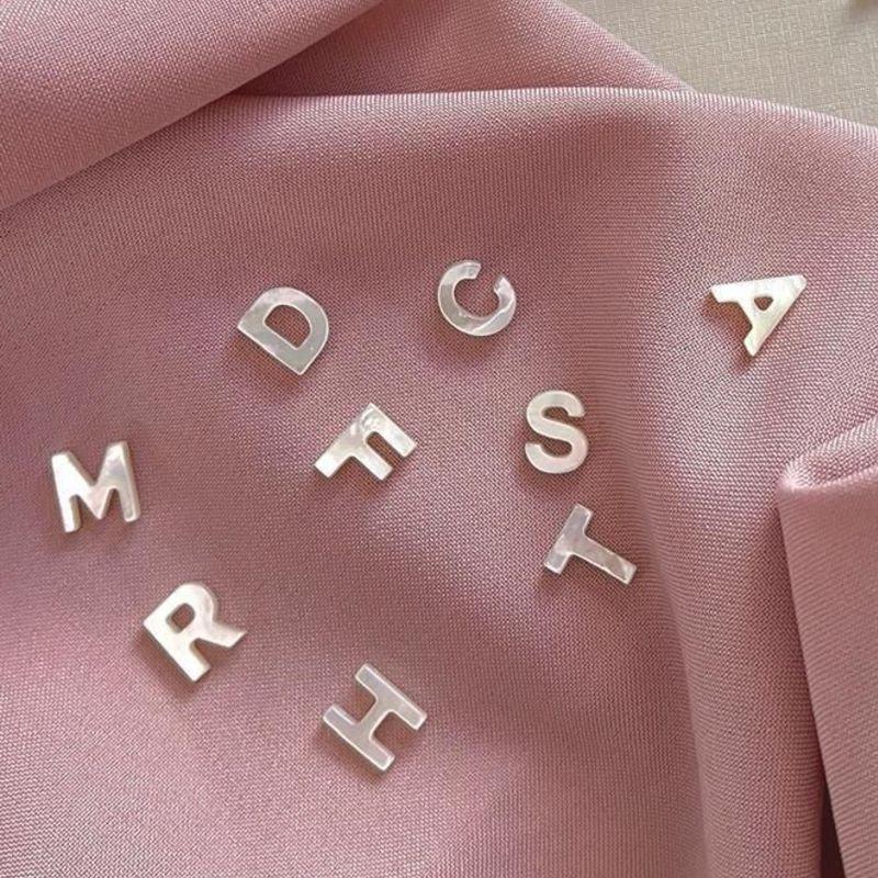 COLAR NYLON LETRAS MADREPEROLA C