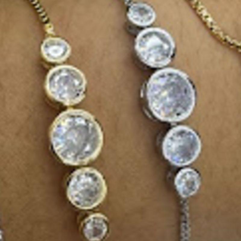 PULSEIRA OURO ZIRCONIAS REGULAVEL