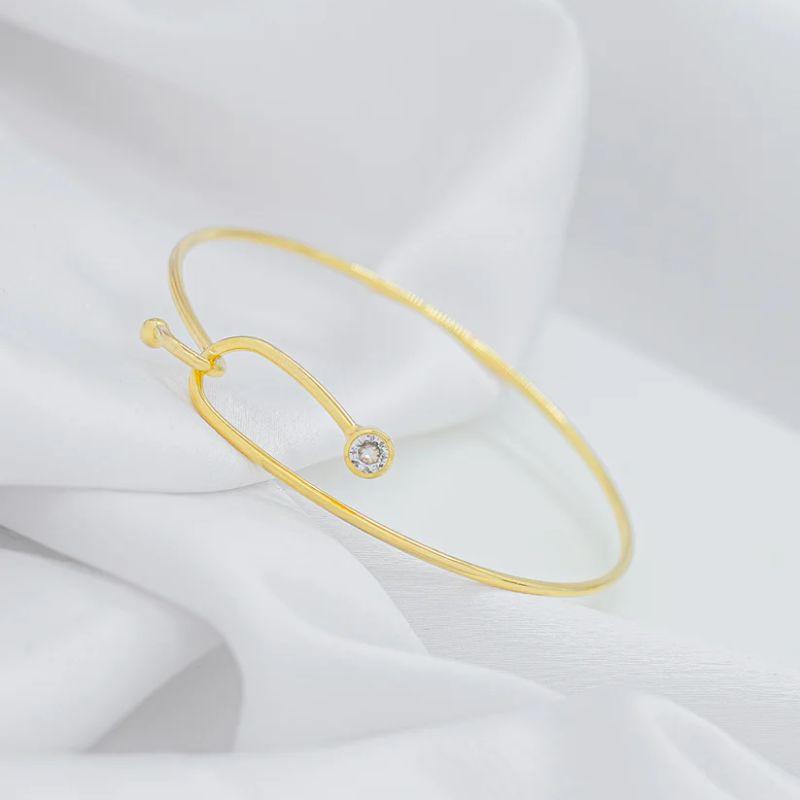 Bracelete Aro Fino Pontas Entrelaçadas com Ponto de Luz