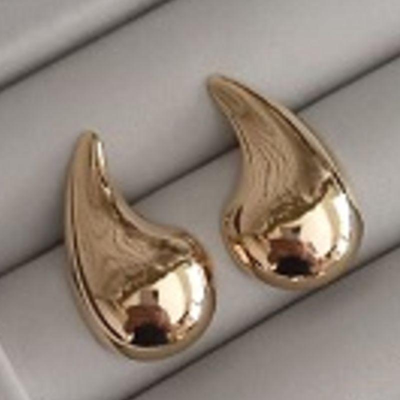 BRINCO GOTA ORGANICA OURO POLIDO G