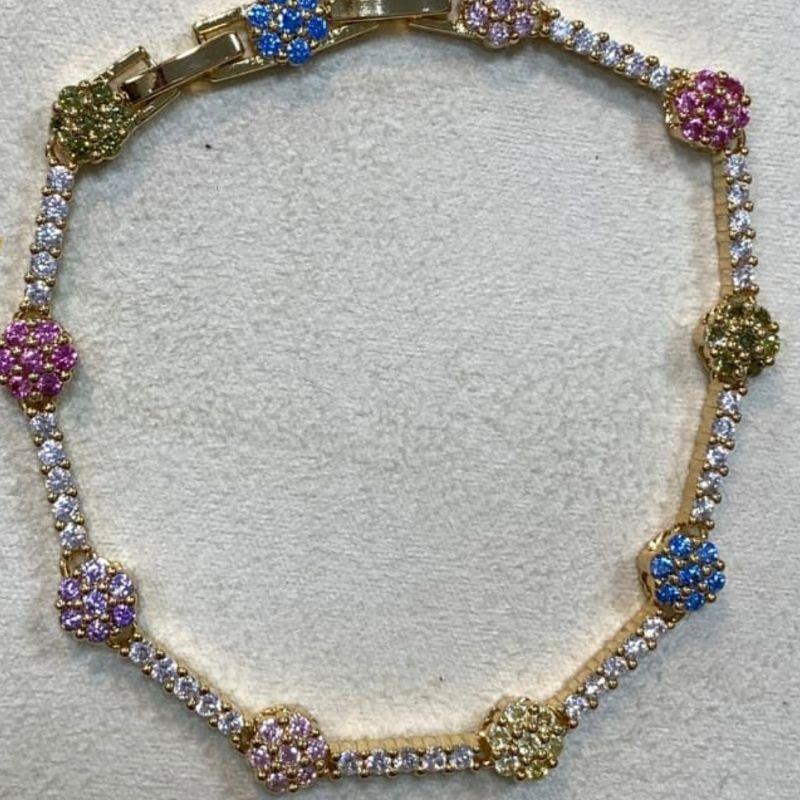 PULSEIRA RIVIERA OURO FLORES COLORIDAS