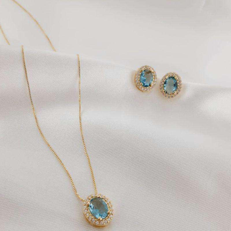 CONJUNTO CRAVEJADO OVAL AZUL OURO