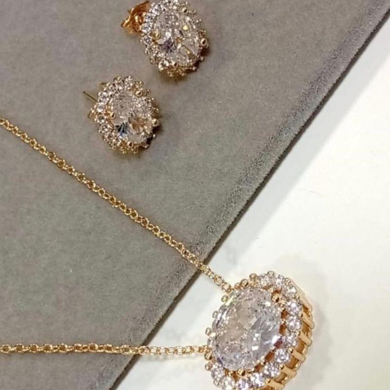 CONJUNTO OURO OVAL CRAVEJADO